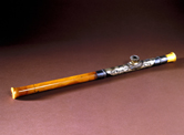 Image: Ivory opium pipe with ornate metal mount, Chinese.